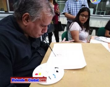 Joel Ramos en el Dia Munidal Pintor Boca y Pie